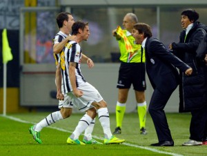 Marchiso celebrating with Conte after his goal against Inter