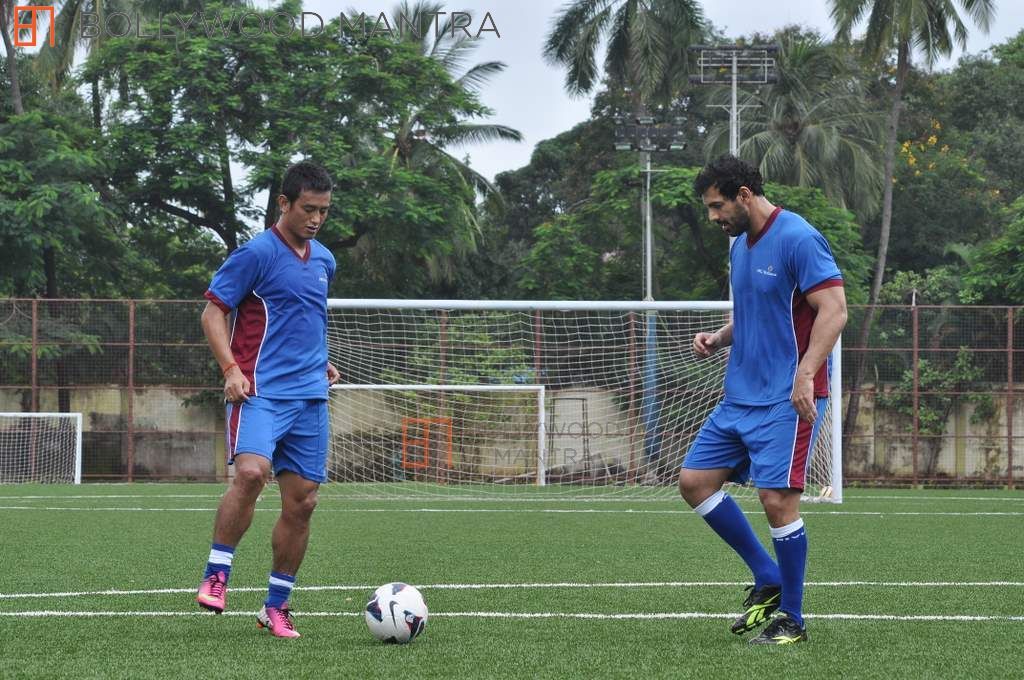 Indian footballing legend Bhaichung Bhutia alongside Bollywood's John Abraham