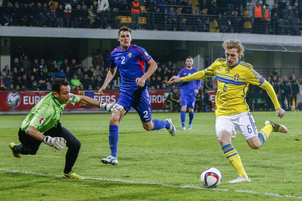 Emil Forsberg (R) of Sweden fights with Ilie Cebanu (L) and Igor Armas (C) of Moldova during the UEFA EURO 2016 qualifying, soccer match between national team of Moldova and Sweden, at Zimbru Stadium, in Chisinau, Moldova, on 27 March 2015. Sweden win 2:0. (Photo by Dumitru Doru/EPA)