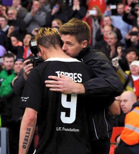Steven Gerrard and and Fernando Torre Hug each other