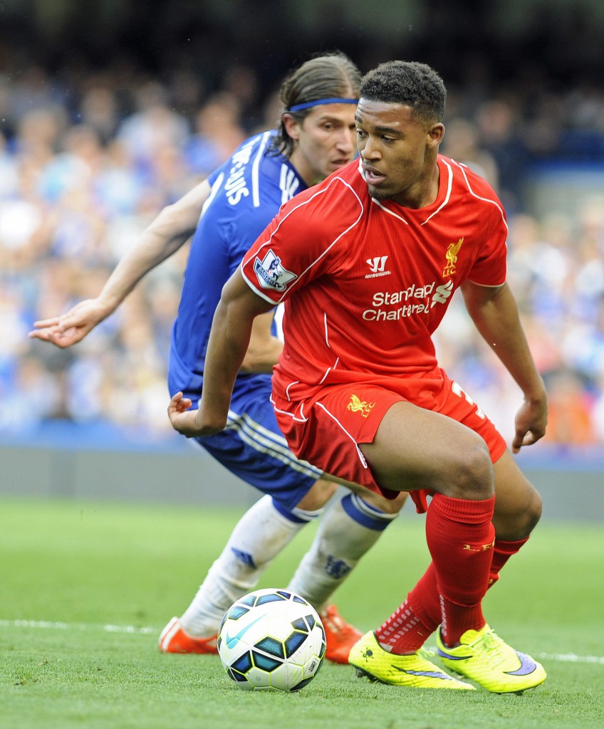 Liverpool's Jordan Ibe (R) in action against Chelsea's Filipe Luis (L) during the English Premier League soccer match between Chelsea FC and Liverpool FC at Stamford Bridge in London, Britain, 10 May 2015. EPA/GERRY PENNY