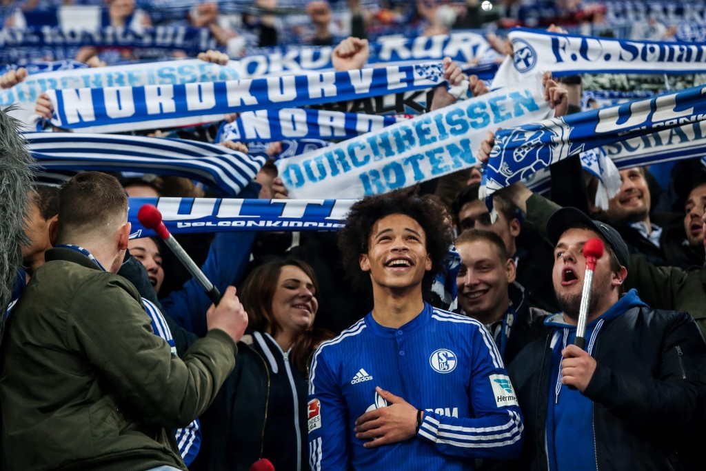 Schalke's Leroy Sane (C) celebrates after the German Bundesliga match between FC Schalke 04 vs Hannover 96 in Gelsenkirchen, Germany, 04 December 2015. Picture Credits: EPA/Maja Hitij