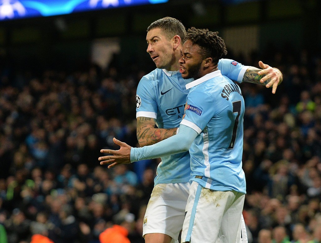 Aleksandar Kolarov (left) and Raheem Sterling (right) of Manchester City