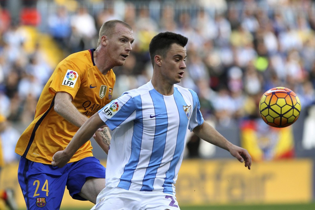 Jeremy Mathieu's game time could be restricted at Barcelona and Arsene Wenger could move for his compatriot to solve Arsenal's central defensive crisis. (Picture Courtesy - AFP/Getty Images)