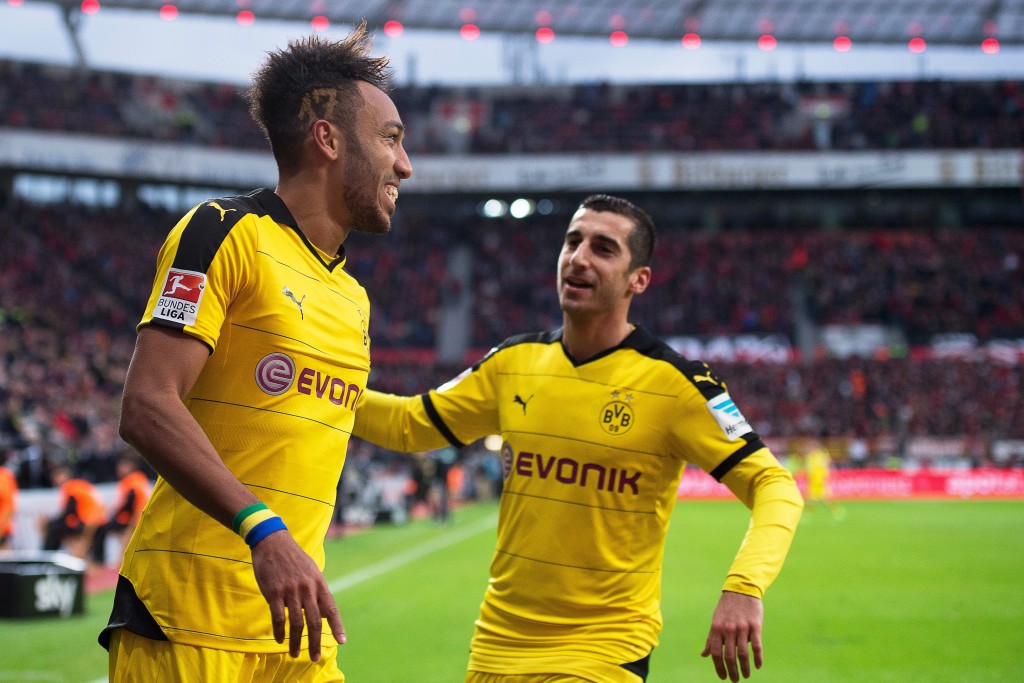 Dortmund's Pierre-Emerick Aubameyang (L) celebrates with his teammate Henrikh Mkhitaryan (R) after scoring the 1-0 lead during the German Bundesliga soccer match between Bayer 04 Leverkusen and Borussia Dortmund in Leverkusen, Germany, 21 February 2016. EPA/MARIUS BECKER