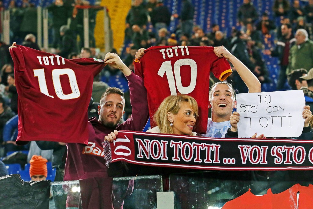 Roma supporters cheer for Francesco Totti before the Italian Serie A soccer match between AS Roma and US Palermo at Olimpico stadium in Rome, Italy, 21 February 2016. (Photo by Alessandro di Meo/EPA)