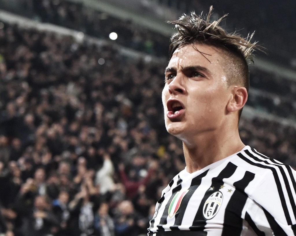 epa05206834 Juventus' Paulo Dybala jubilates after scoring the goal during the Italian Serie A soccer match Juventus FC vs US Sassuolo at the Juventus Stadium in Turin, Italy, 11 March 2016. EPA/ANDREA DI MARCO