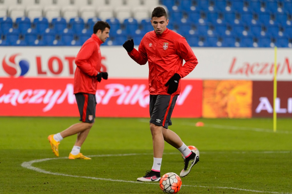 Serbia's national soccer team palyer Marko Grujic (R) warms up during their training session in Poznan, Poland, 22 March 2016.EPA/Jakub Kaczmarczyk POLAND OUT
