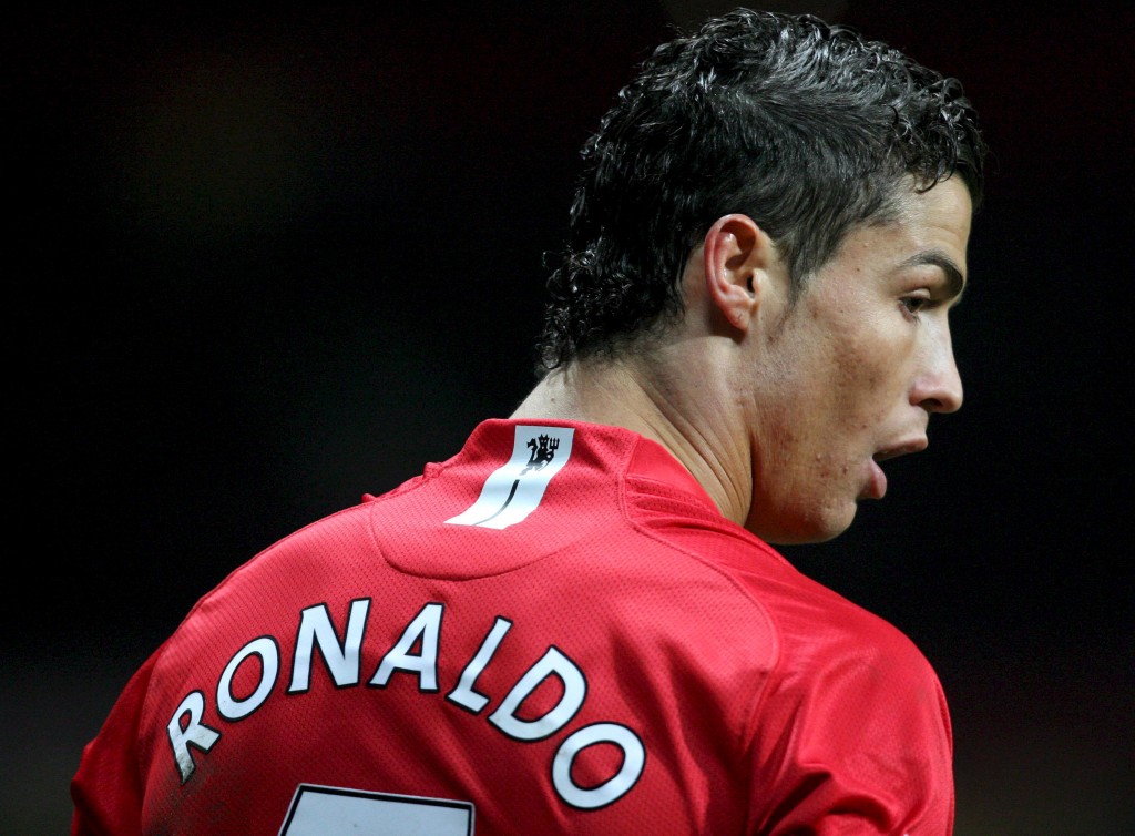 epa01757848 (FILE) Manchester United's Cristiano Ronaldo during their English Premier league soccer match against Everton at Old Trafford stadium in Manchester, England, on 31 January 2009. Manchester United accepted an 80-million-pound (131.7-million-dollar) bid from Real Madrid for winger Cristiano Ronaldo on 11 June 2009. A statement on the club?s website said: "At Cristiano?s request -who has again expressed his desire to leave - and after discussion with the player?s representatives, United have agreed to give Real Madrid permission to talk to the player." EPA/LINDSEY PARNABY NO ONLINE/INTERNET USE WITHOUT A LICENCE FROM THE FOOTBALL DATA CO LTD.