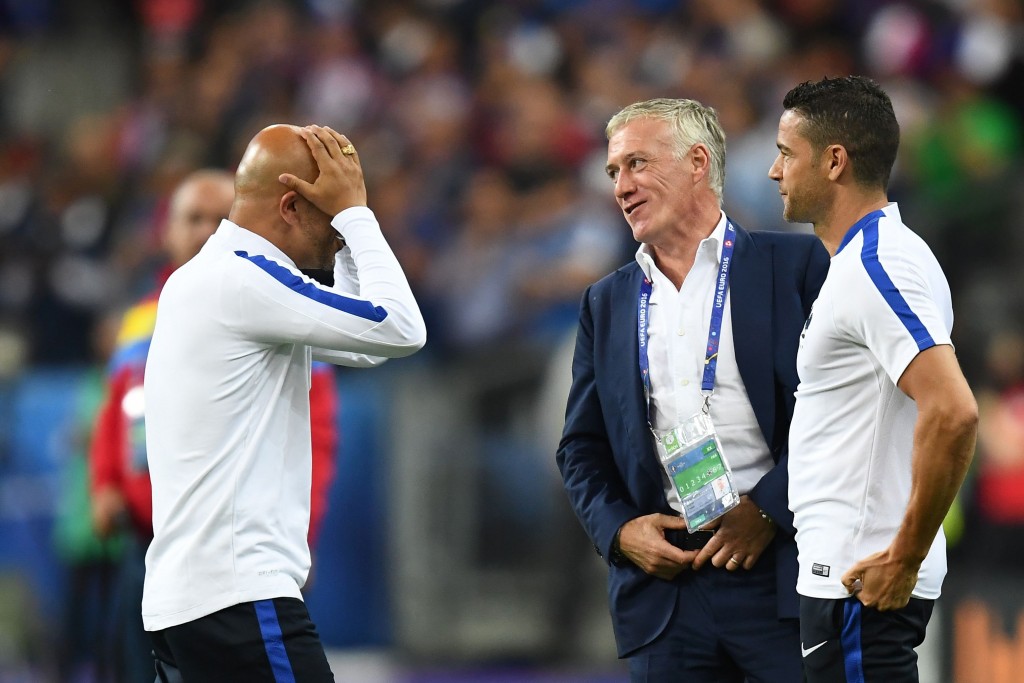 France's coach Didier Deschamps (C) reacts after the Euro 2016 group A football match between France and Romania at Stade de France, in Saint-Denis, north of Paris, on June 10, 2016. / AFP / FRANCK FIFE (Photo credit should read FRANCK FIFE/AFP/Getty Images)