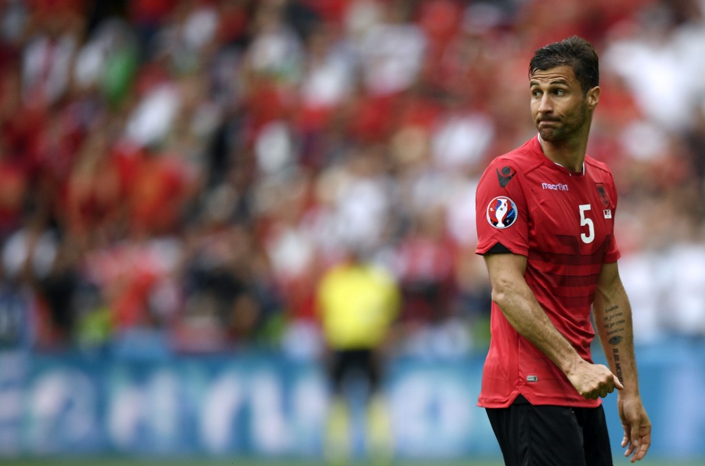 Albania's defender Lorik Cana reacts after being shown the red card during the Euro 2016 group A football match between Albania and Switzerland at the Bollaert-Delelis Stadium in Lens on June 11, 2016. / AFP / MARTIN BUREAU (Photo credit should read MARTIN BUREAU/AFP/Getty Images)