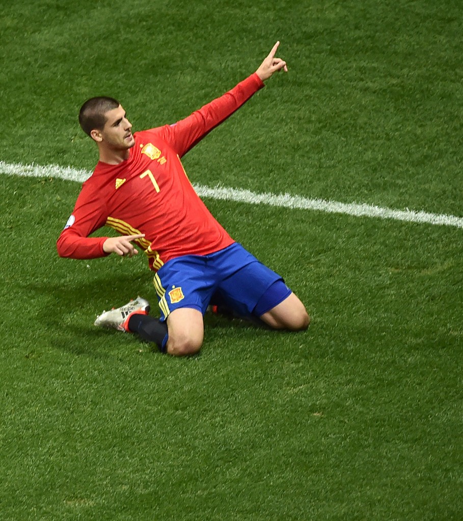 Spain's forward Alvaro Morata celebrates after scoring the 1-0 during the Euro 2016 group D football match between Spain and Turkey at the Allianz Riviera stadium in Nice on June 17, 2016. / AFP / BERTRAND LANGLOIS (Photo credit should read BERTRAND LANGLOIS/AFP/Getty Images)