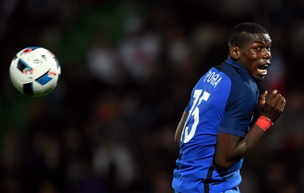 TOPSHOT - France's midfielder Paul Pogba looks on during the friendly football match between France and Scotland, at the St Symphorien Stadium in Longeville-lès-Metz, Eastern France, on June 4, 2016. / AFP / FRANCK FIFE (Photo credit should read FRANCK FIFE/AFP/Getty Images)