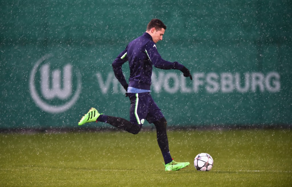 WOLFSBURG, GERMANY - MARCH 07: Julian Draxler of Wolfsburg runs with the ball during a training session prior to the UEFA Champions League match against Gent at Volkswagen Arena on March 7, 2016 in Wolfsburg, Germany. (Photo by Stuart Franklin/Bongarts/Getty Images)