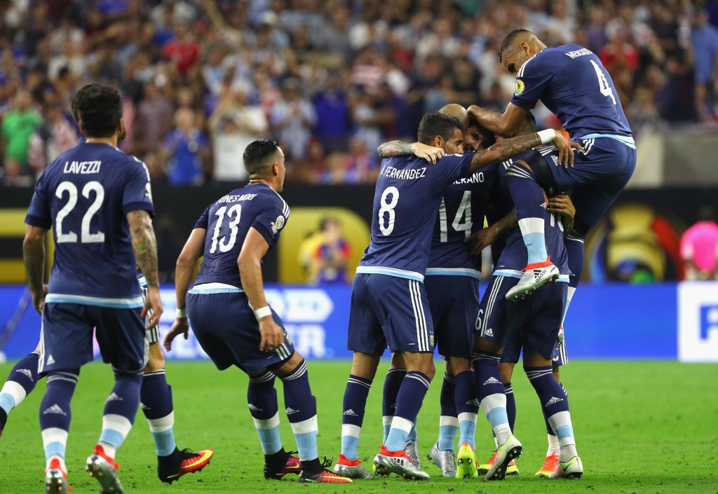 HOUSTON, TX - JUNE 21: Lionel Messi #10 of Argentina celebrates with teammates after scoring a goal on a free kick in the first half against the United States during a 2016 Copa America Centenario Semifinal match at NRG Stadium on June 21, 2016 in Houston, Texas. (Photo by Scott Halleran/Getty Images)