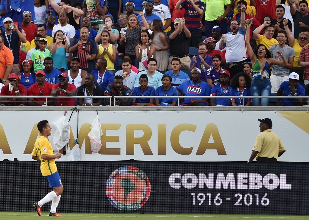 Brazil's Philippe Coutinho celebrates after scoring against Haiti during a Copa America Centenario football match in Orlando, Florida, United States, on June 8, 2016. / AFP / Hector RETAMAL (Photo credit should read HECTOR RETAMAL/AFP/Getty Images)