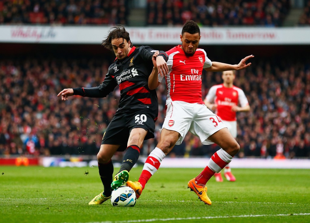 LONDON, ENGLAND - APRIL 04: Francis Coquelin of Arsenal battles for the ball with Lazar Markovic of Liverpool during the Barclays Premier League match between Arsenal and Liverpool at Emirates Stadium on April 4, 2015 in London, England. (Photo by Julian Finney/Getty Images)