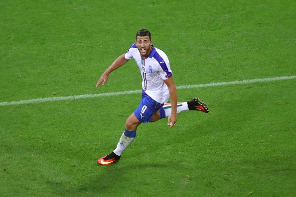 LYON, FRANCE - JUNE 13: Graziano Pelle of Italy celebrates scoring his team's second goal during the UEFA EURO 2016 Group E match between Belgium and Italy at Stade des Lumieres on June 13, 2016 in Lyon, France. (Photo by Clive Brunskill/Getty Images)