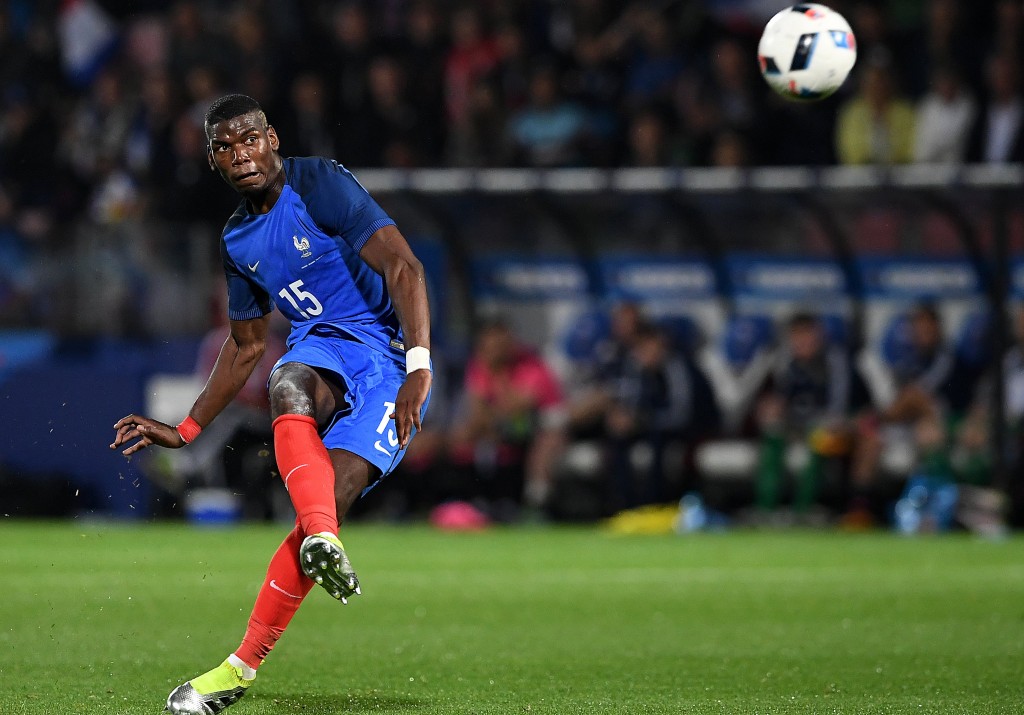 France's midfielder Paul Pogba kicks the ball during the friendly football match between France and Scotland, at the St Symphorien Stadium in Longeville-lès-Metz, Eastern France, on June 4, 2016. / AFP / FRANCK FIFE (Photo credit should read FRANCK FIFE/AFP/Getty Images)
