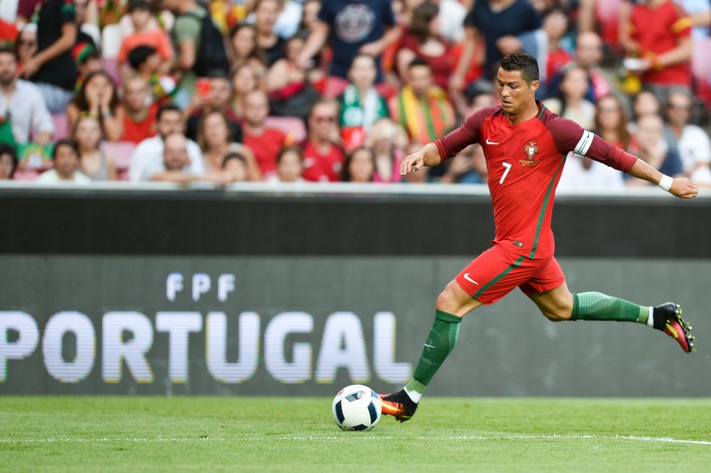 Portugal's forward Cristiano Ronaldo controls the ball during the friendly football match Portugal vs Estonia at Luz stadium in Lisbon on June 8, 2016, in preparation for the upcoming UEFA Euro 2016 Championship. / AFP / PATRICIA DE MELO MOREIRA (Photo credit should read PATRICIA DE MELO MOREIRA/AFP/Getty Images)