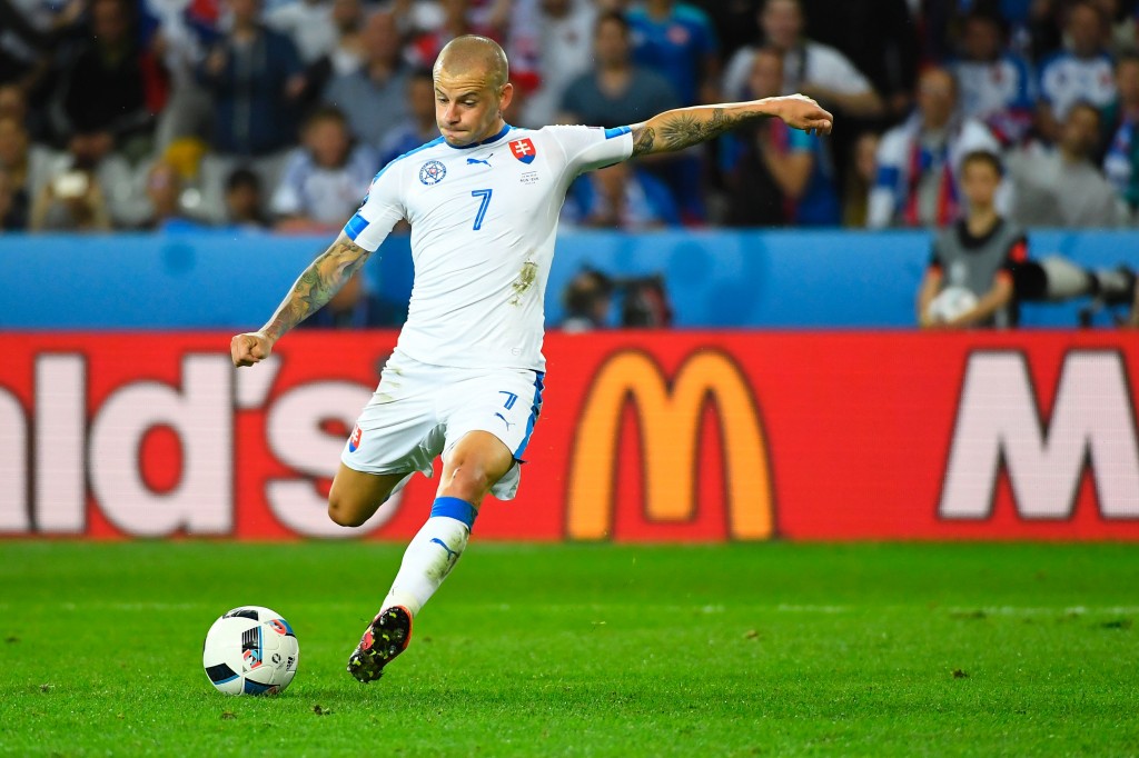 Slovakia's midfielder Vladimir Weiss shoots to score a goal during the Euro 2016 group B football match between Russia and Slovakia at the Pierre-Mauroy stadium in Villeneuve-d'Ascq, near Lille on June 15, 2016. / AFP / Joe KLAMAR (Photo credit should read JOE KLAMAR/AFP/Getty Images)