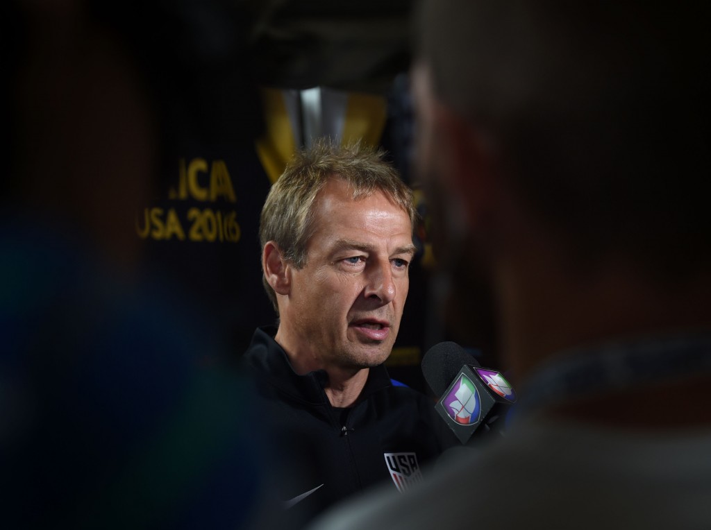 USA coach Jurgen Klinsmann speaks to the media at the University of Phoenix Stadium in Phoenix, Arizona, on June 23, 2016, two days before the team's COPA America 2016, 3rd place final soccer match against Colombia. / AFP / Mark Ralston (Photo credit should read MARK RALSTON/AFP/Getty Images)