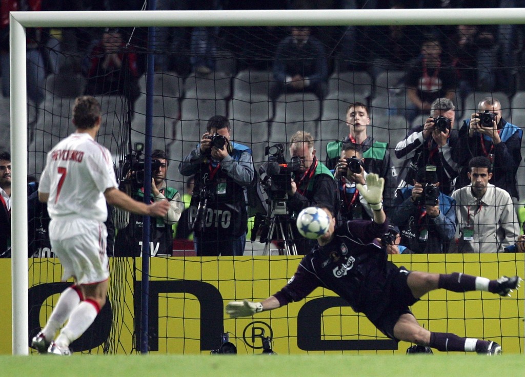 Liverpool's Polish goalkeeper Jerzy Dudek (R) saves a penalty kick by AC Milan's Ukrainian forward Andriy Shevchenko to win the UEFA Champions league football final, 25 May 2005 at the Ataturk Stadium in Istanbul. Liverpool won 3-2 on penalties. AFP PHOTO FILIPPO MONTEFORTE (Photo credit should read FILIPPO MONTEFORTE/AFP/Getty Images)