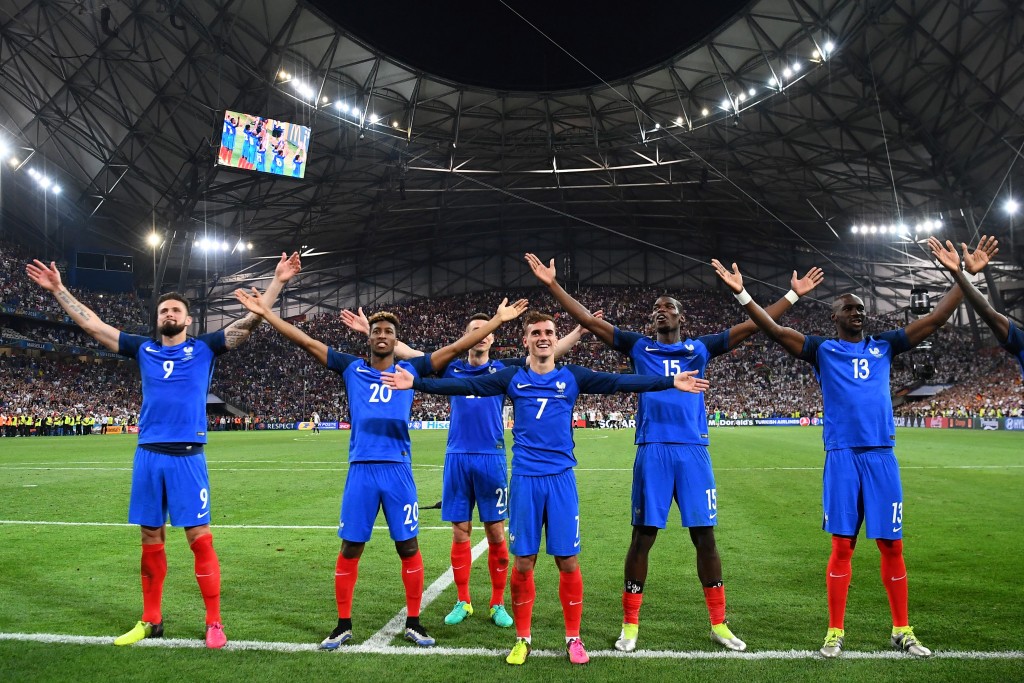 From left: France's forward Olivier Giroud, forward Kingsley Coman, defender Laurent Koscielny, forward Antoine Griezmann, midfielder Paul Pogba, France's defender Eliaquim Mangala celebrate after beating Germany 2-0 in the Euro 2016 semi-final football match between Germany and France at the Stade Velodrome in Marseille on July 7, 2016. France will face Portugal in the Euro 2016 finals on July 10, 2016. / AFP / FRANCK FIFE (Photo credit should read FRANCK FIFE/AFP/Getty Images)