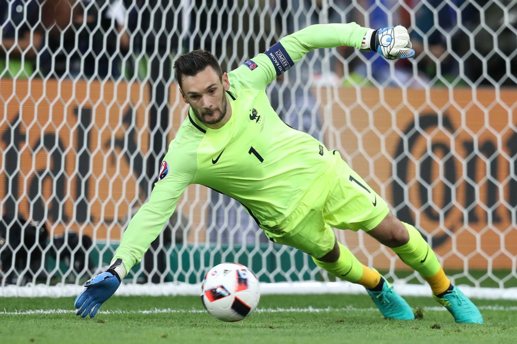 France's goalkeeper Hugo Lloris dives for the ball during the Euro 2016 semi-final football match between Germany and France at the Stade Velodrome in Marseille on July 7, 2016. / AFP / Valery HACHE (Photo credit should read VALERY HACHE/AFP/Getty Images)