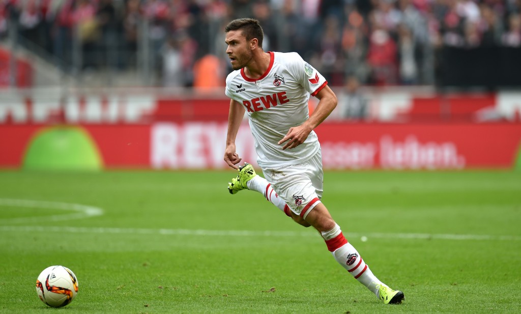 Cologne's defender Jonas Hector runs with the ball during the German first division Bundesliga football match FC Cologne vs Borussia Moenchengladbach in Cologne, western Germany on September 19, 2015. Cologne won the match 1-0. AFP PHOTO / PATRIK STOLLARZ RESTRICTIONS: DURING MATCH TIME: DFL RULES TO LIMIT THE ONLINE USAGE TO 15 PICTURES PER MATCH AND FORBID IMAGE SEQUENCES TO SIMULATE VIDEO. == RESTRICTED TO EDITORIAL USE == FOR FURTHER QUERIES PLEASE CONTACT DFL DIRECTLY AT + 49 69 650050. (Photo credit should read PATRIK STOLLARZ/AFP/Getty Images)
