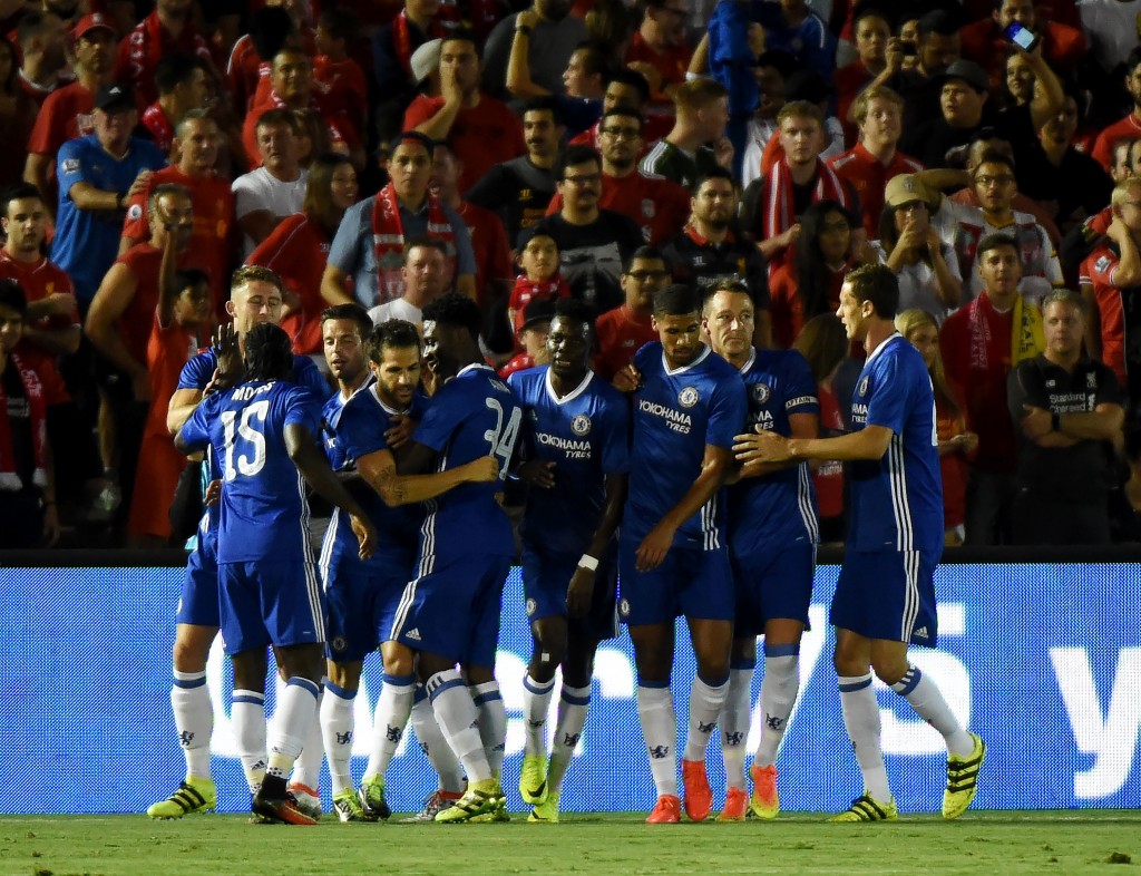 Chelsea defender Gary Cahill (4th L) celebrates with teammates after scoring a goal during their International Champions Cup (ICC) football match against Liverpool at the Rose Bowl Stadium in Pasadena, California on July 27, 2016. Chelsea won 1-0. (Photo by Mark Ralston/AFP/Getty Images)