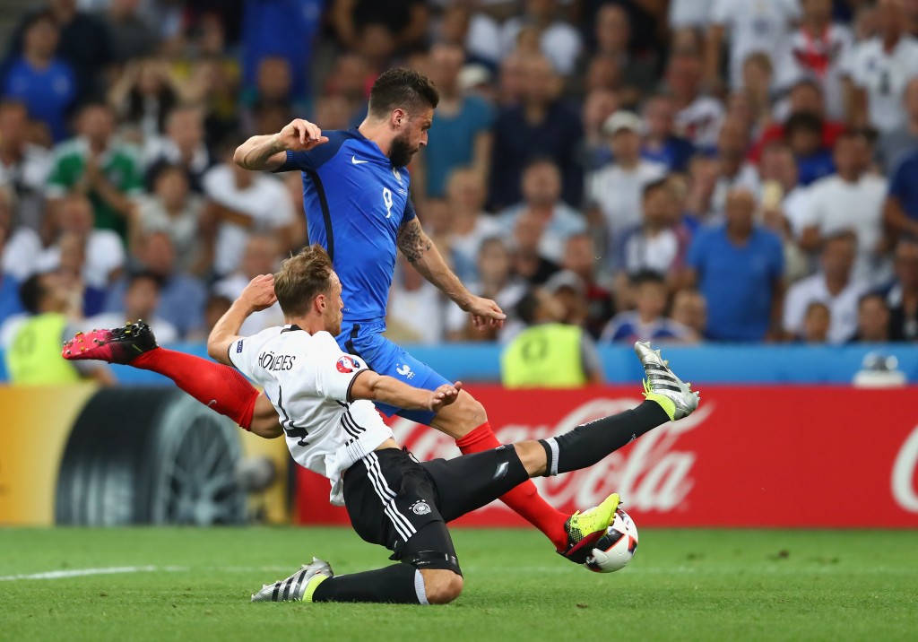 MARSEILLE, FRANCE - JULY 07: The shot by Olivier Giroud of France is blocked by Benedikt Hoewedes of Germany during the UEFA EURO semi final match between Germany and France at Stade Velodrome on July 7, 2016 in Marseille, France. (Photo by Alexander Hassenstein/Getty Images)