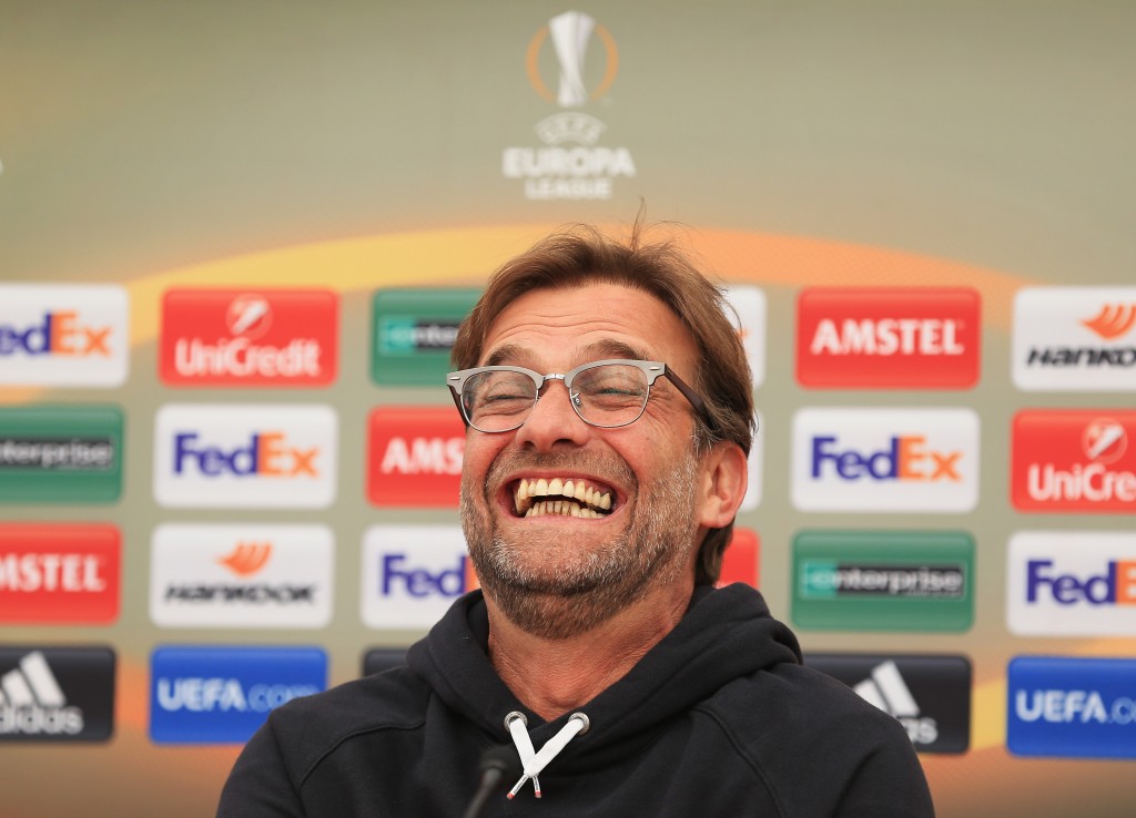 LIVERPOOL, ENGLAND - MAY 04: Jurgen Klopp, manager of Liverpool laughs during a press conference ahead of the UEFA Europa League Semi-Final Second Leg match against Villarreal at Melwood Training Ground on May 4, 2016 in Liverpool, England. (Photo by Clint Hughes/Getty Images)