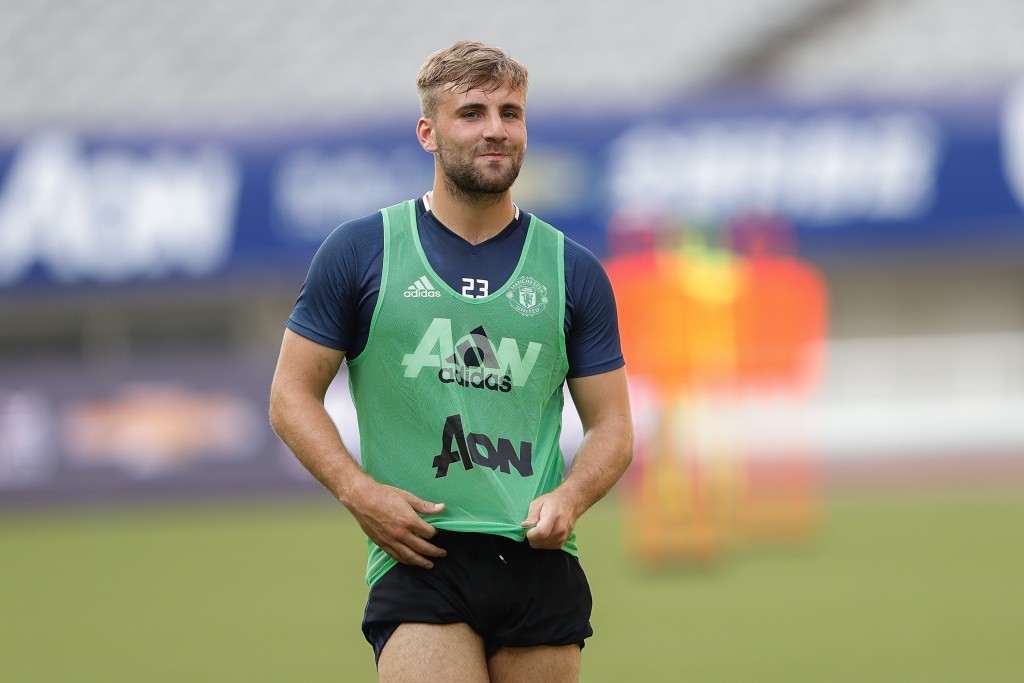 Happy at Old Trafford - Luke Shaw is not moving away from Manchester United. (Photo courtesy - Lintao Zhang/Getty Images)