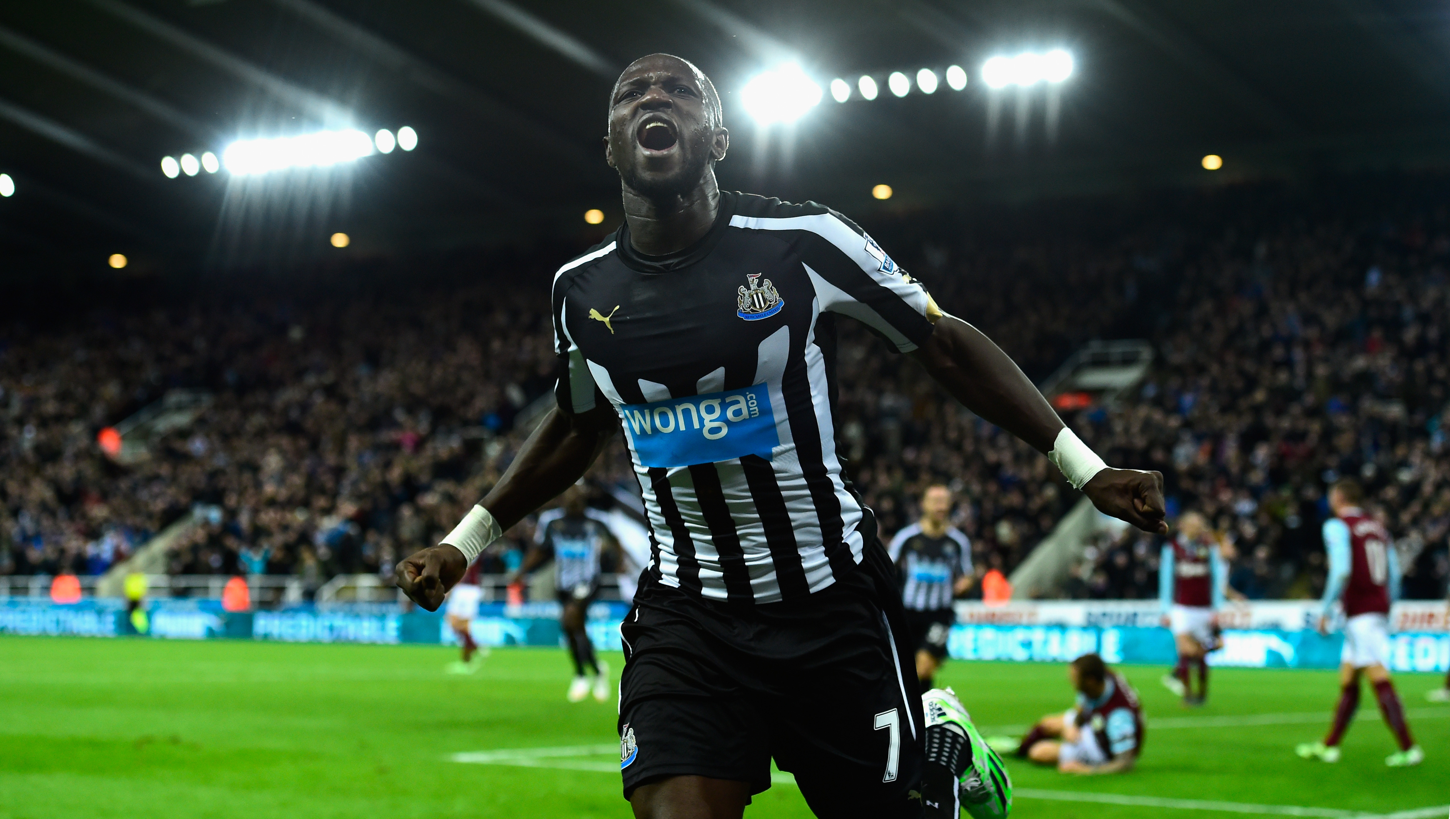 NEWCASTLE UPON TYNE, ENGLAND - JANUARY 01: Newcastle United player Moussa Sissoko celebrates after scoring their third goal during the Barclays Premier League match between Newcastle United and Burnley at St James' Park on January 1, 2015 in Newcastle upon Tyne, England. (Photo by Stu Forster/Getty Images)