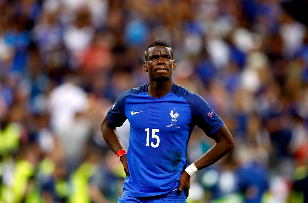 PARIS, FRANCE - JULY 10: Paul Pogba of France shows his dejection after his team's 0-1 defeat in the UEFA EURO 2016 Final match between Portugal and France at Stade de France on July 10, 2016 in Paris, France. (Photo by Clive Rose/Getty Images)