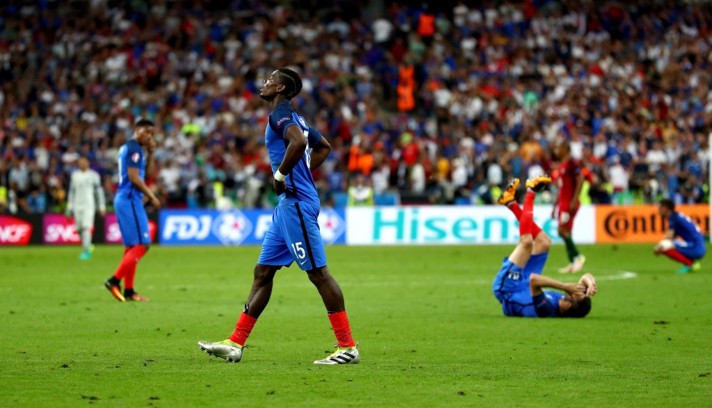 PARIS, FRANCE - JULY 10: Paul Pogba of France shows his dejection after his team's 0-1 defeat in the UEFA EURO 2016 Final match between Portugal and France at Stade de France on July 10, 2016 in Paris, France. (Photo by Lars Baron/Getty Images)