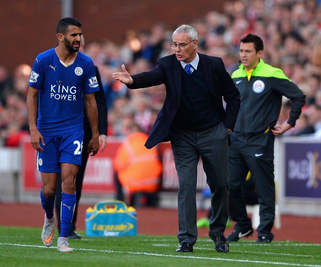 STOKE ON TRENT, ENGLAND - SEPTEMBER 19: Claudio Ranieri Manager of Leicester City instructs his player Riyad Mahrez during the Barclays Premier League match between Stoke City and Leicester City at Britannia Stadium on September 19, 2015 in Stoke on Trent, United Kingdom. (Photo by Gareth Copley/Getty Images)