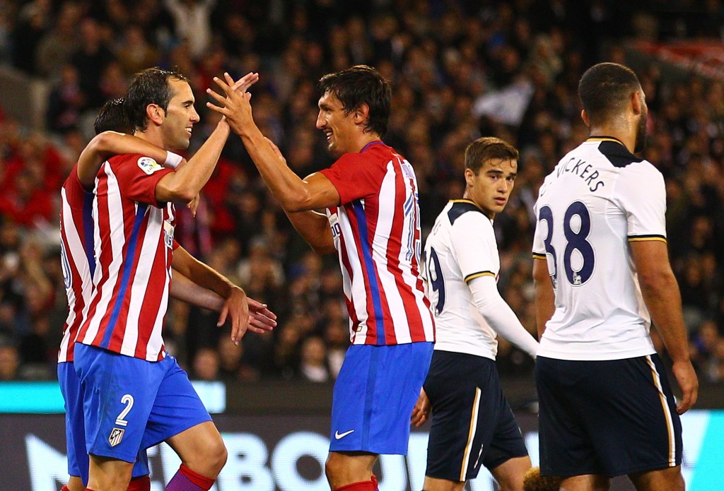 MELBOURNE, AUSTRALIA - JULY 29: Diego Godin of Atletico de Madrid celebrates after scoring their first goal during 2016 International Champions Cup Australia match between Tottenham Hotspur and Atletico de Madrid at the Melbourne Cricket Ground on July 29, 2016 in Melbourne, Australia. (Photo by Scott Barbour/Getty Images)