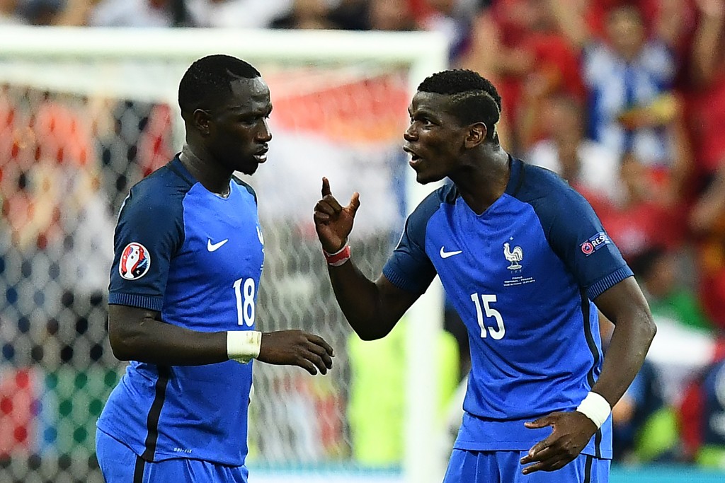 France's midfielder Moussa Sissoko (L) and France's midfielder Paul Pogba react during the last minutes of the Euro 2016 final football match between France and Portugal at the Stade de France in Saint-Denis, north of Paris, on July 10, 2016. Portugal beat France 1-0 to clinch the Euro 2016. / AFP / FRANCK FIFE (Photo credit should read FRANCK FIFE/AFP/Getty Images)
