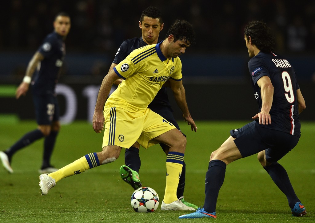 Chelsea's Brazilian-born Spanish striker Diego Costa (C) challenges Paris Saint-Germain's Brazilian defender Marquinhos and Paris Saint-Germain's Uruguayan forward Edinson Cavani (R) during the UEFA Champions League round of 16 football match between Paris Saint-Germain (PSG) and Chelsea at the Parc des Princes stadium in Paris on February 17, 2015. AFP PHOTO / FRANCK FIFE (Photo credit should read FRANCK FIFE/AFP/Getty Images)