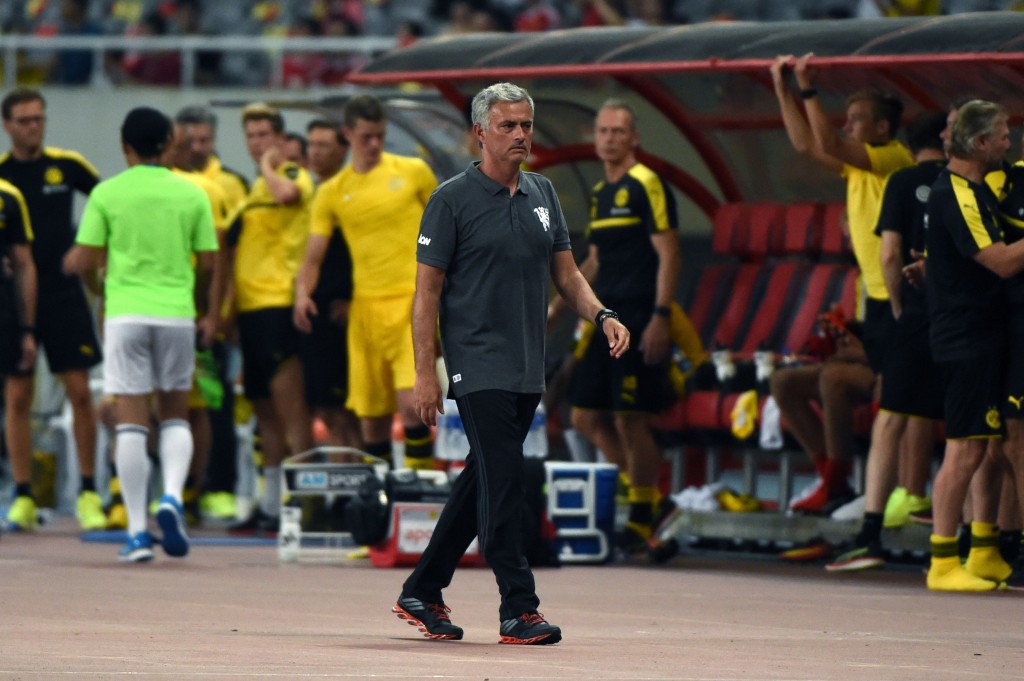 Manchester United's head coach Jose Mourinho exits from the 2016 International Champions Cup football match between Manchester United and Dortmund in Shanghai on July 22, 2016. / AFP / WANG ZHAO (Photo credit should read WANG ZHAO/AFP/Getty Images)