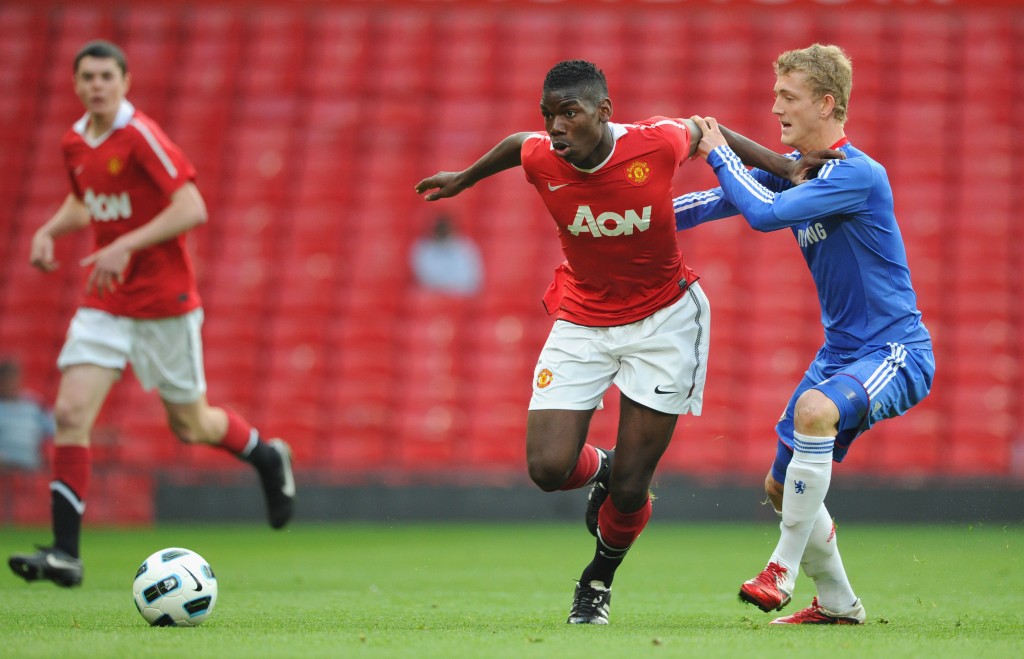 MANCHESTER, ENGLAND - APRIL 20: Bobby Devyne of Chelsea battles Paul Pogba of Manchester United during the FA Youth Cup Semi Final 2nd Leg between Manchester United and Chelsea at Old Trafford on April 20, 2011 in Manchester, England. (Photo by Michael Regan/Getty Images)