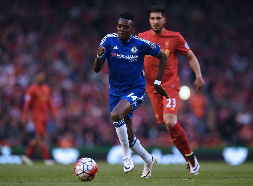 Chelsea's Burkina Faso midfielder Bertrand Traore runs away from Liverpool's German midfielder Emre Can during the English Premier League football match between Liverpool and Chelsea at Anfield in Liverpool, north west England on May 11, 2016. / AFP / Paul ELLIS / RESTRICTED TO EDITORIAL USE. No use with unauthorized audio, video, data, fixture lists, club/league logos or 'live' services. Online in-match use limited to 75 images, no video emulation. No use in betting, games or single club/league/player publications. / (Photo credit should read PAUL ELLIS/AFP/Getty Images)