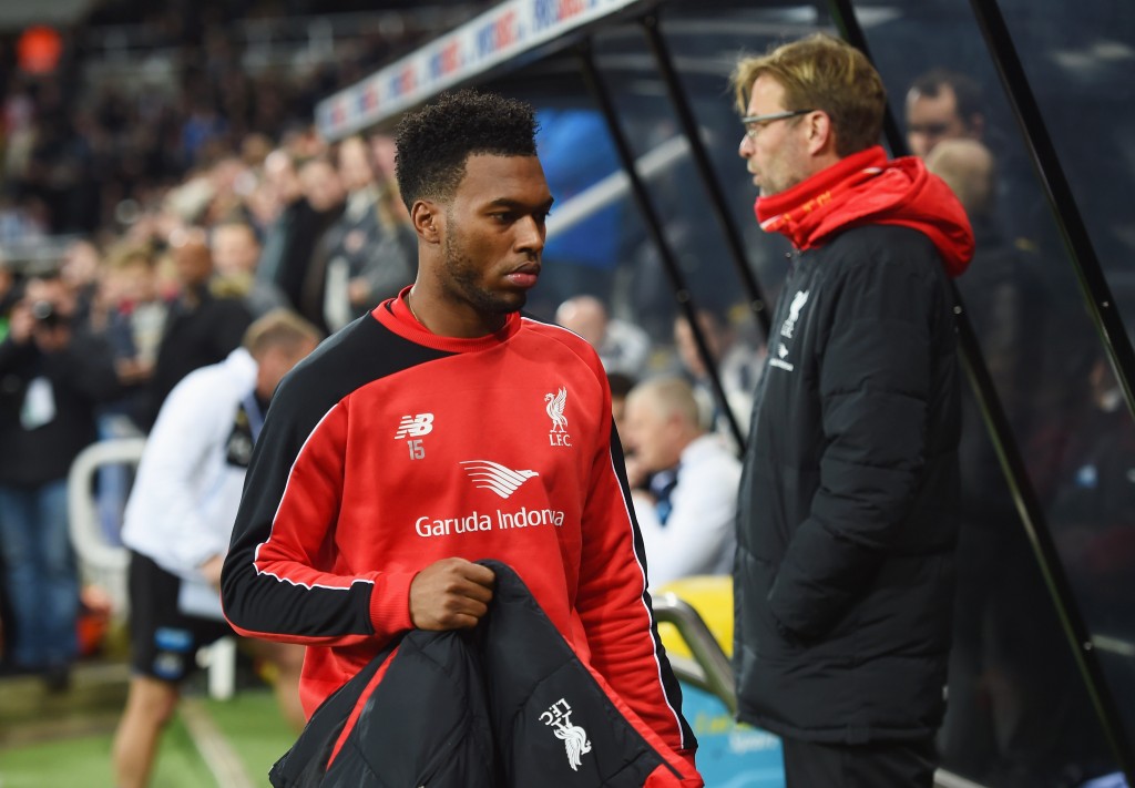 NEWCASTLE UPON TYNE, ENGLAND - DECEMBER 06: Substitute Daniel Sturridge of Liverpool walks to the bench past Jurgen Klopp manager of Liverpool prior to the Barclays Premier League match between Newcastle United and Liverpool at St James' Park on December 6, 2015 in Newcastle upon Tyne, England (Photo by Michael Regan/Getty Images)