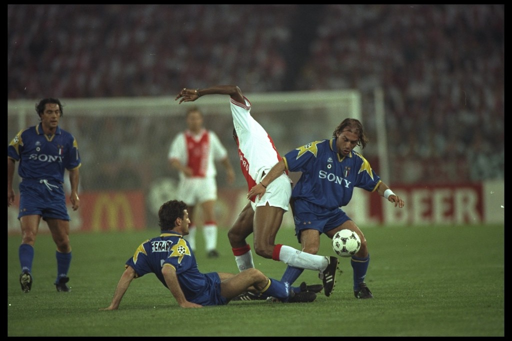 23 May 1996: Antonio Conte and Ciro Ferrera of Juventus challenge Nwankwo Kanu of Ajax during the European Cup Final in Amsterdam, Netherlands. The game went to penaltys after full time the score was 1-1 and Juventus won the penaltys 4-2. Mandatory Credit: Shaun Botterill /Allsport