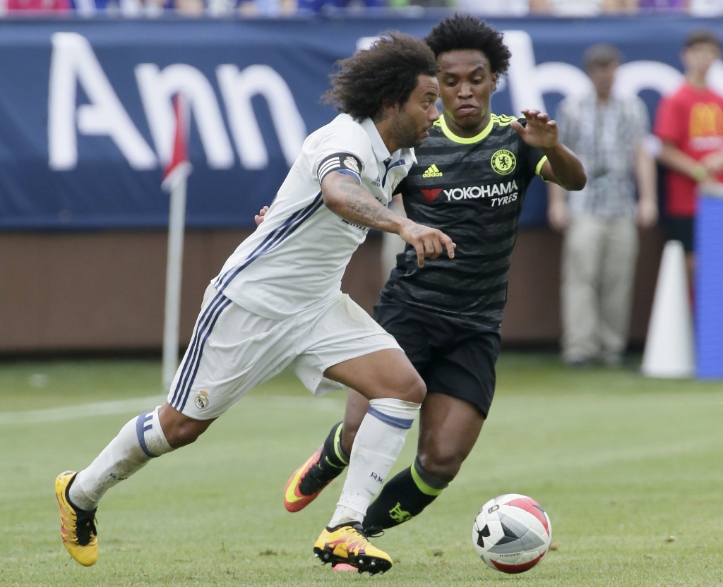 ANN ARBOR, MI - JULY 30: Willian #22 of Chelsea defends against Marcelo Vieira Da Silva #12 of Real Madrid during the first half at Michigan Stadium on July 30, 2016 in Ann Arbor, Michigan. (Photo by Duane Burleson/Getty Images)