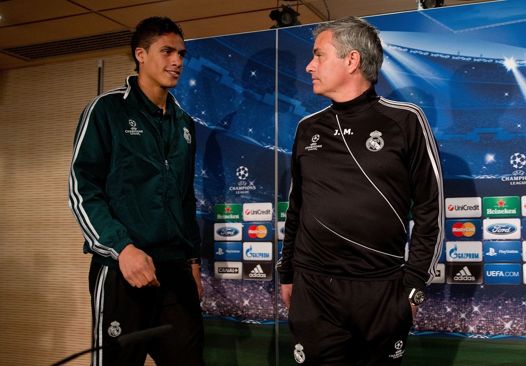 MADRID, SPAIN - APRIL 02: Head coach Jose Mourinho (R) and Real madrid player Raphael varane prior to start a press conference ahead of the UEFA Champions League Quarterfinal match between Real Madrid and Galatasaray AS at Santiago Bernabeu Stadium on April 2, 2013 in Madrid, Spain. (Photo by Gonzalo Arroyo Moreno/Getty Images)