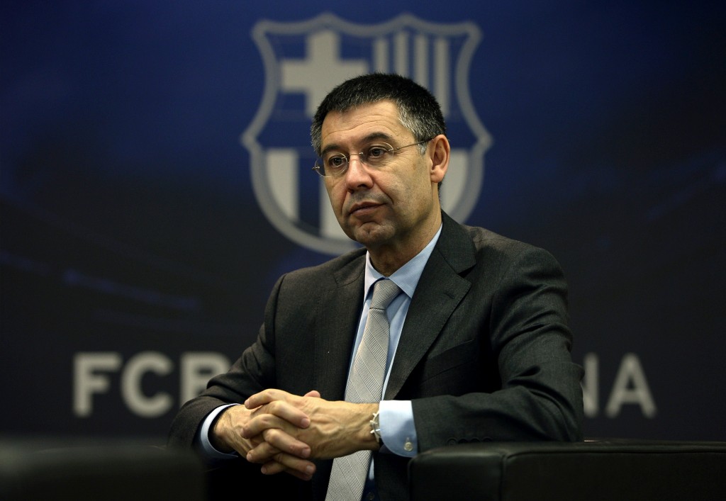 TO GO WITH AFP INTERVIEW FC Barcelona's president Josep Maria Bartomeu answers to AFP journalists during an interview at Camp Nou stadium in Barcelona on March 24, 2014. Bartomeu has insisted that Lionel Messi will become the world's highest paid footballer once negotiations over his new contract are finalised. AFP PHOTO/ LLUIS GENE (Photo credit should read LLUIS GENE/AFP/Getty Images)