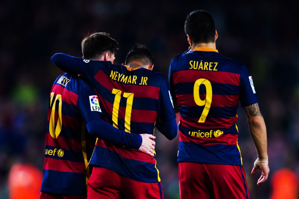 BARCELONA, SPAIN - APRIL 23: Neymar Santos Jr of FC Barcelona is congratulated by his teammates Luis Suarez and Lionel Messi after scoring his team's fifth goal during the La Liga match between FC Barcelona and Sporting Gijon at Camp Nou on April 23, 2016 in Barcelona, Spain. (Photo by Alex Caparros/Getty Images)